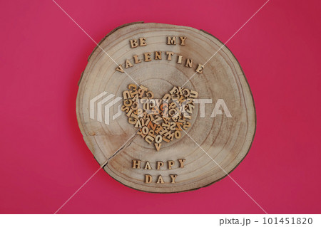 Alphabet letters on wooden square pieces forming heart shape Alphabet letters on wooden square pieces forming heart shape 101451820
