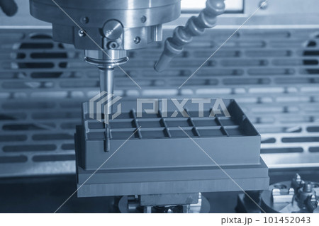 The CNC milling machine rough cutting the graphite electrode parts with solid ball end mill. 101452043