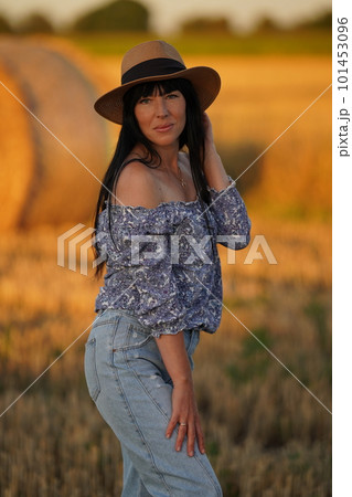 Portrait of a happy Ukrainian girl in nature during the harvest, Ukrainian rich nature and beauty of a Ukrainian woman Portrait of a happy Ukrainian girl in nature during the harvest, Ukrainian rich nature and beauty of a Ukrainian woman 101453096