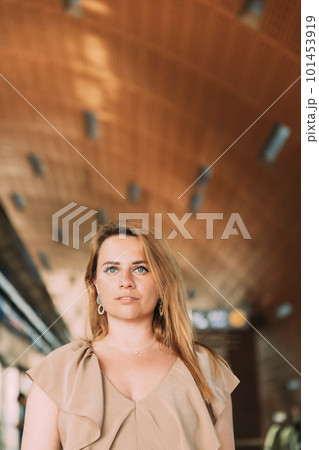 Portrait of young caucasian woman lady tourist traveler standing on the Dubai metro train station. High quality photo Portrait of young caucasian woman lady tourist traveler standing on the Dubai metro train station. High quality photo 101453919