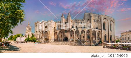 Avignon, Provence, France. Panorama of Ancient Popes Palace, Saint-Benezet, Avignon, Provence, France. Famous landmark. Altered Sunset Sunrise Sky 101454066