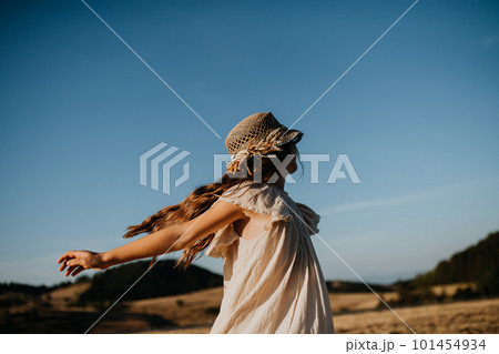 Portrait of a beautiful little girl feeling free in summer in nature. Portrait of a beautiful little girl feeling free in summer in nature. 101454934