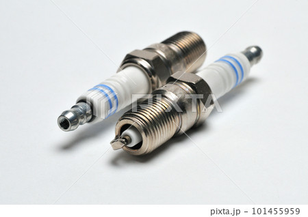 Car spark plug on isolated white background 101455959