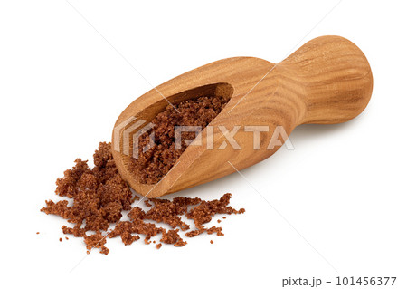 Dark muscovado sugar or Barbados sugar in wooden scoop isolated on white background 101456377