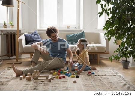 Cheerful daddy and positive daughter kid enjoying leisure together 101457158