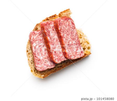 Smoked sausage. Sliced salami and bread isolatd on white background. Smoked sausage. Sliced salami and bread isolatd on white background. 101458080