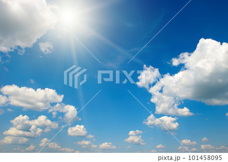 Bright sun on beautiful blue sky with white clouds. Bright sun on beautiful blue sky with white clouds. 101458095