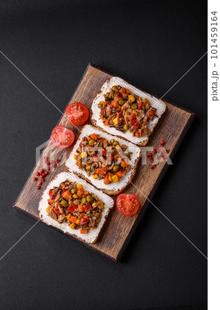 Delicious veggie sandwiches with canned tuna and mexican mix Delicious veggie sandwiches with canned tuna and mexican mix 101459164