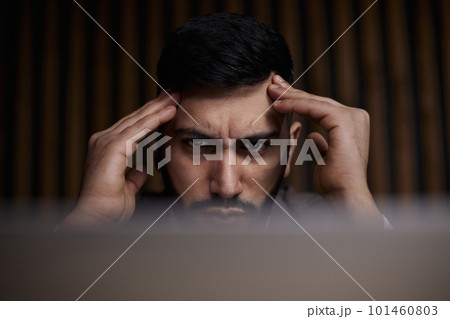 businessman working on laptop in modern office lobby space. 101460803