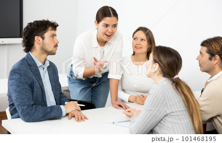 Male and female students learning course subject together Male and female students learning course subject together 101468195