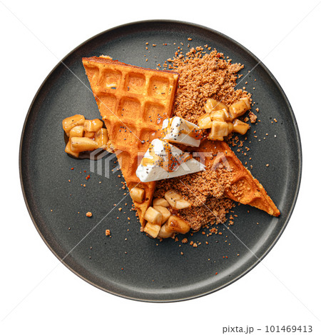 Waffles with ice cream and babanas in caramel 101469413