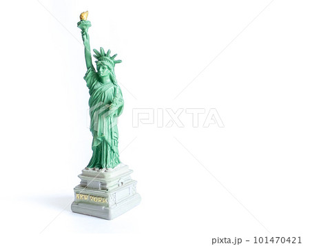 Small Liberty Statue souvenir on white background, a landmark of New York city 101470421
