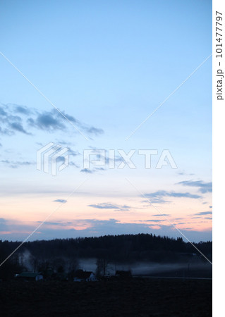 Glorious sunset over grassy rural landscape . Amazing panoramic sunset sky with colorful clouds. Gradient color. Sky texture, abstract nature background Glorious sunset over grassy rural landscape . Amazing panoramic sunset sky with colorful clouds. Gradient color. Sky texture, abstract nature background 101477797
