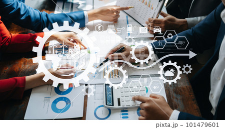 Business team working virtual modern smartphone to reduce CO2 emissions carbon footprint climate change to limit global warming.Sustainable development and green business concept. at office. 101479601