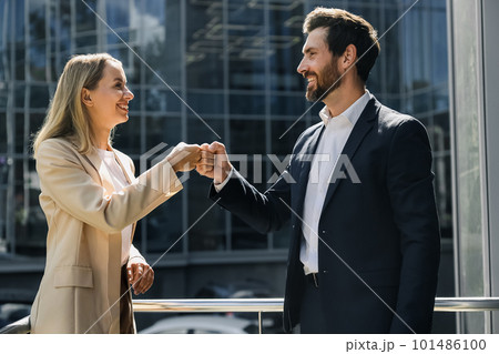 Business partners looking happy and contented Business partners looking happy and contented 101486100