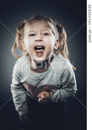 caucasian girl with pigtails angry expression caucasian girl with pigtails angry expression 101488836