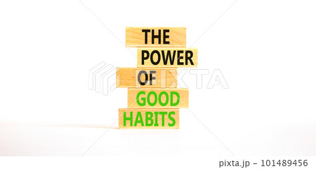 The power of good habits symbol. Concept words The power of good habits on wooden block. Beautiful white table white background. Business the power of good habits concept. Copy space. 101489456