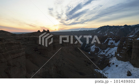 Charyn Grand Canyon with orange rock walls. Almaty 101489802