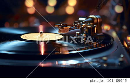 Vinyl record player, bright lights disco-bokeh. Needle on vinyl record.Vintage record player while recording, the record spins and music plays. Gramophone close-up 101489946