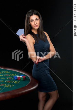 sexy woman with poker cards and chips sexy woman with poker cards and chips 101491354