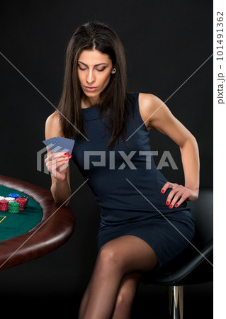 sexy woman with poker cards and chips 101491362