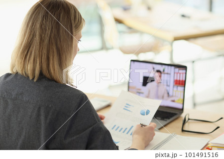 Manager talks to partner on video call via modern laptop 101491516