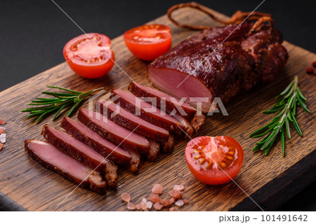 Delicious duck fillet or breast grilled or smoked with spices and salt Delicious duck fillet or breast grilled or smoked with spices and salt 101491642