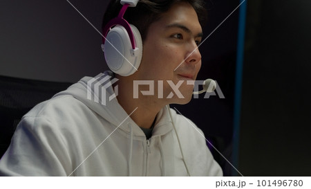 Game streamer using pc setup playing multiplayer first person shooter Game streamer using pc setup playing multiplayer first person shooter 101496780
