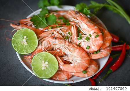 shrimp on white plate background dining table food, Fresh shrimps prawns seafood lemon lime with herbs and spice 101497869
