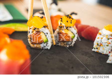 Close up of tasty japanese uramaki sushi with salmon 101502306