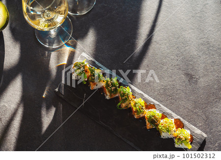 Close up of tasty japanese uramaki sushi with salmon 101502312