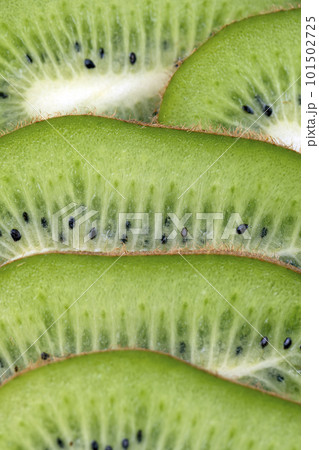Ripe soft green kiwi with black seeds Ripe soft green kiwi with black seeds 101502725
