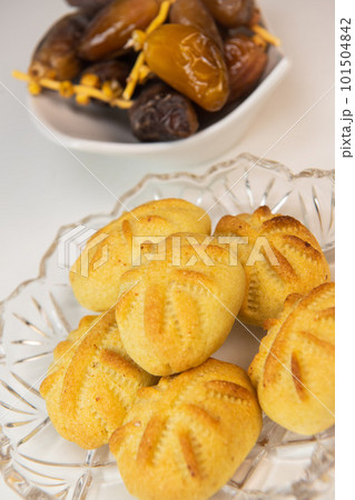 Traditional eid maamoul or mamoul cookies with dates, nuts, and jam, Arabic sweets for Aid al-Fitr 101504842