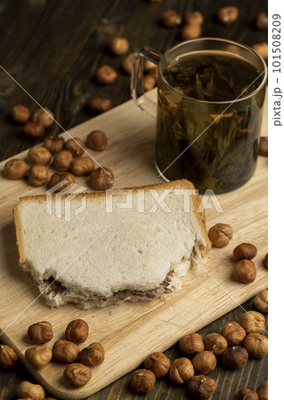 slices of bread with chocolate butter on the table 101508209