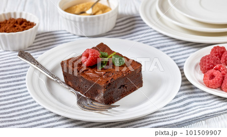 chocolate brownies with fresh raspberry and mint 101509907