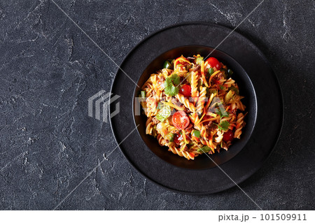 pasta salad with ground beef and veggies in bowl pasta salad with ground beef and veggies in bowl 101509911