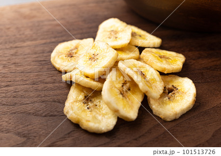 banana chips cookies on wooden background banana chips cookies on wooden background 101513726