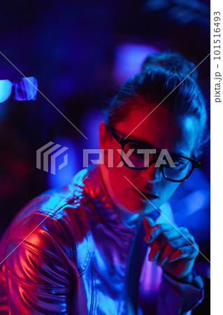 pensive trendy business woman in glasses 101516493