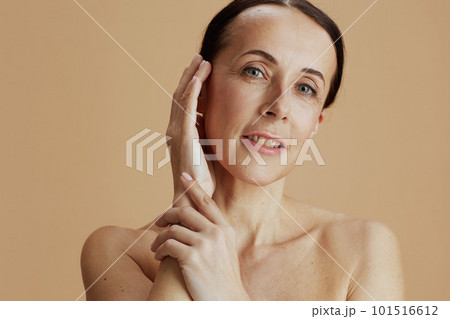 modern woman posing isolated on beige background 101516612
