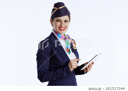 smiling stylish female stewardess on white 101517244