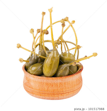 Capers isolated on white background. Pickled capers. Canned capers. Capers isolated on white background. Pickled capers. Canned capers. 101517988