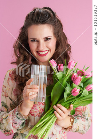 happy elegant woman with long wavy brunette hair on pink happy elegant woman with long wavy brunette hair on pink 101519327