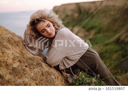 Young woman resting in nature. People, lifestyle, relaxation and vacations concept. Fashion. 101519807