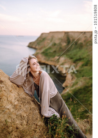 Young woman resting in nature. People, lifestyle, relaxation and vacations concept. Fashion. 101519808