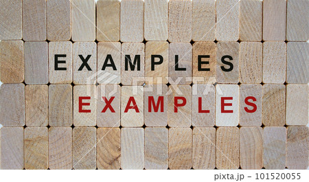Wooden blocks form the words 'examples, examples'. Beautiful wooden background. Wooden blocks form the words 'examples, examples'. Beautiful wooden background. 101520055