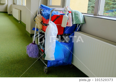 room cleaning service carts with cleaning products 101520373