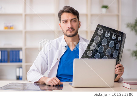 Young male doctor radiologist working in the clinic 101521280