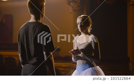 Ballet dancers warm up and prepare for performance Ballet dancers warm up and prepare for performance 101522664