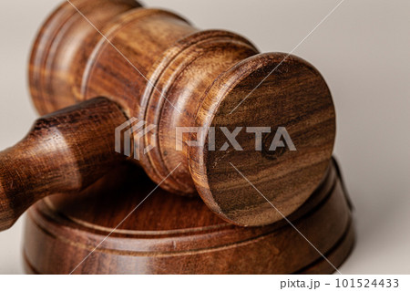 Wooden judges gavel on table close up Wooden judges gavel on table close up 101524433