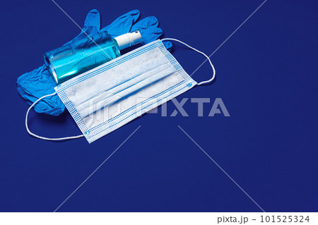 Face mask, medical gloves and sanitizer. Coronavirus prevention concept Face mask, medical gloves and sanitizer. Coronavirus prevention concept 101525324